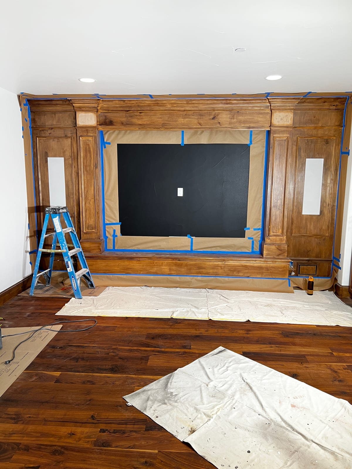 Walnut media wall · staining & finishing — before
